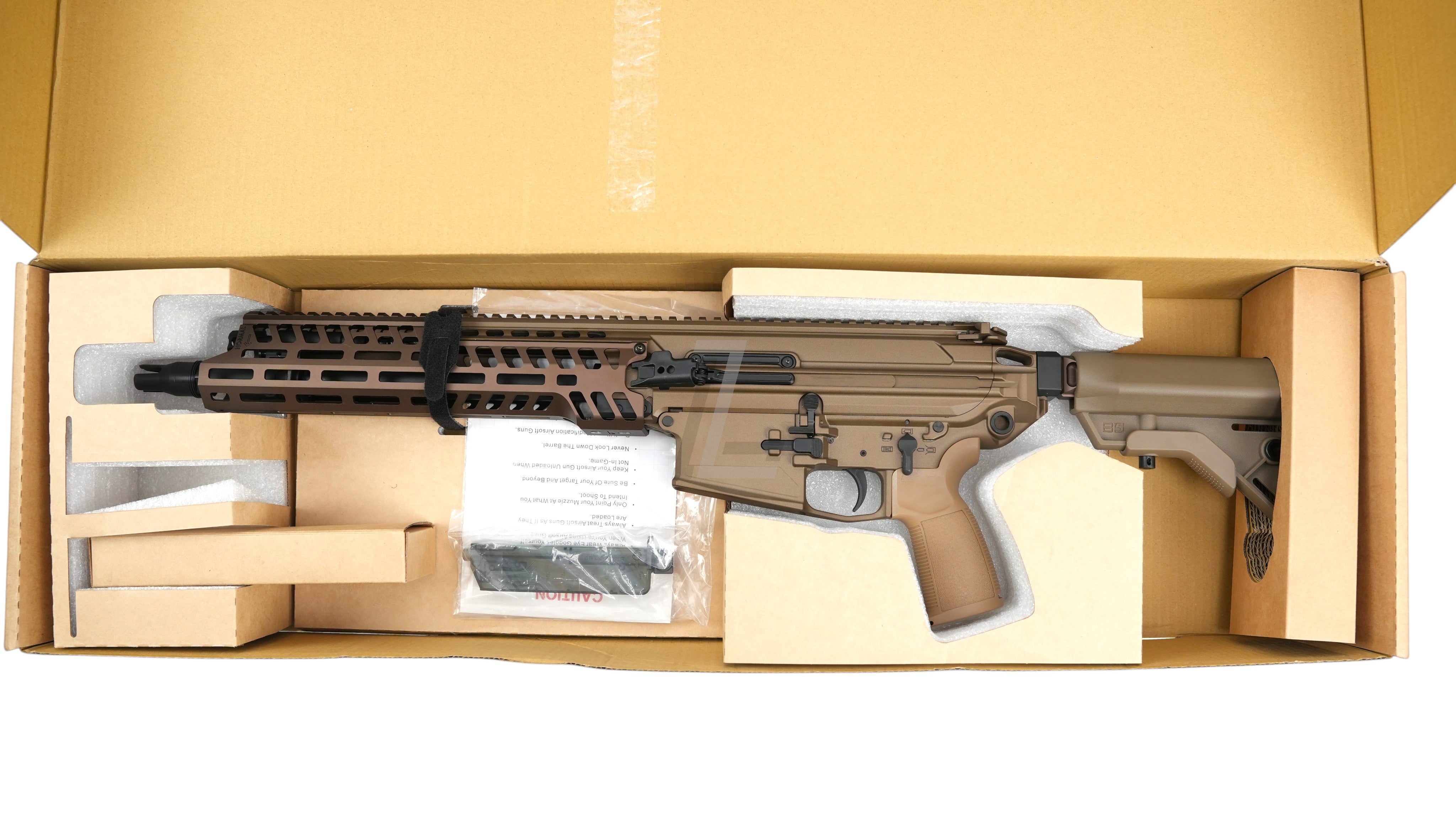 Landing Zone APFG XM7 GBB airsoft rifle in tan and brown finish, featuring a full metal body and M-LOK handguard in box.
