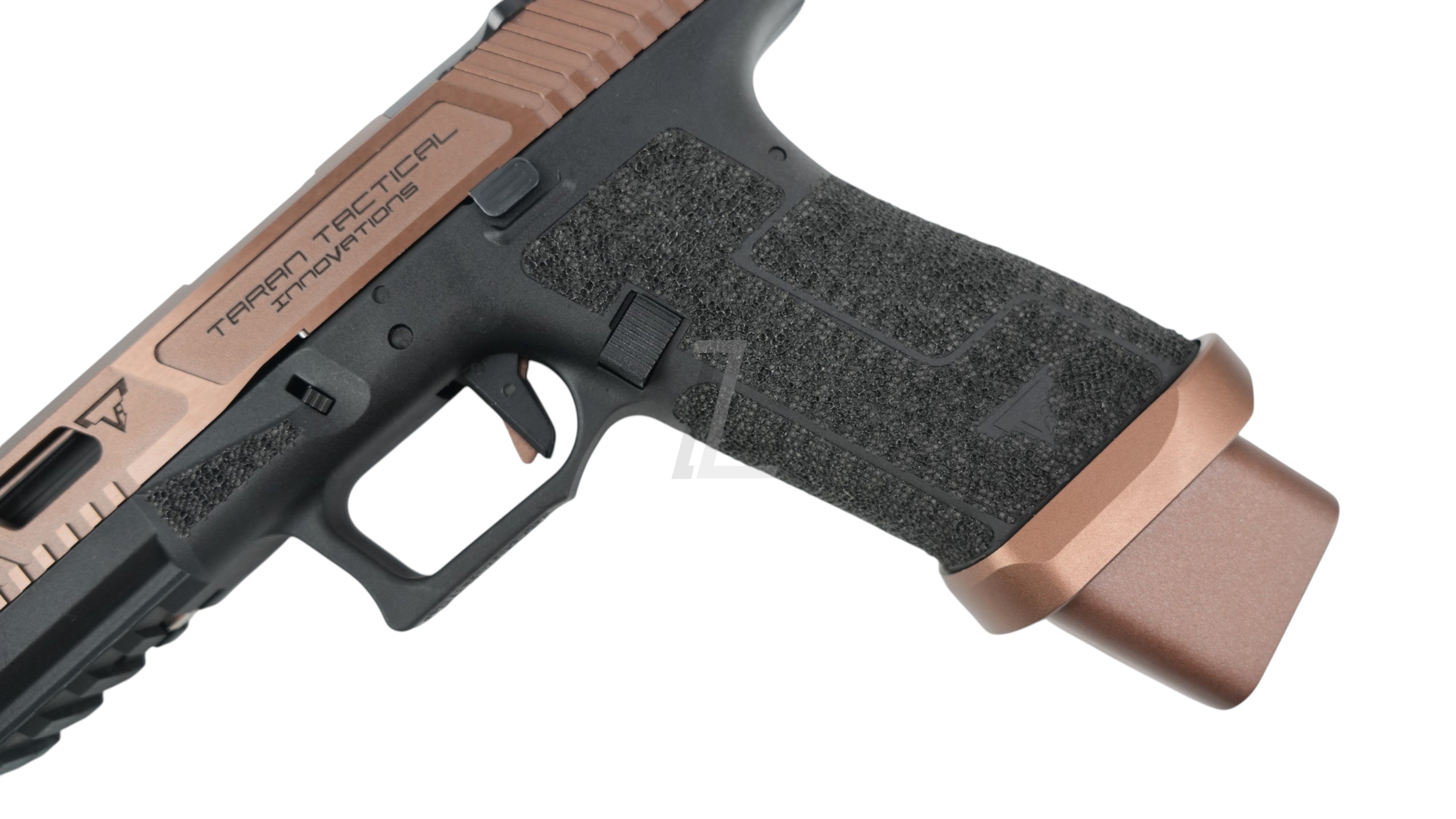 Landing Zone ARMY ARMAMENT TTI Ballerina G17 GBB airsoft pistol in bronze featuring textured grip and TTI markings.
