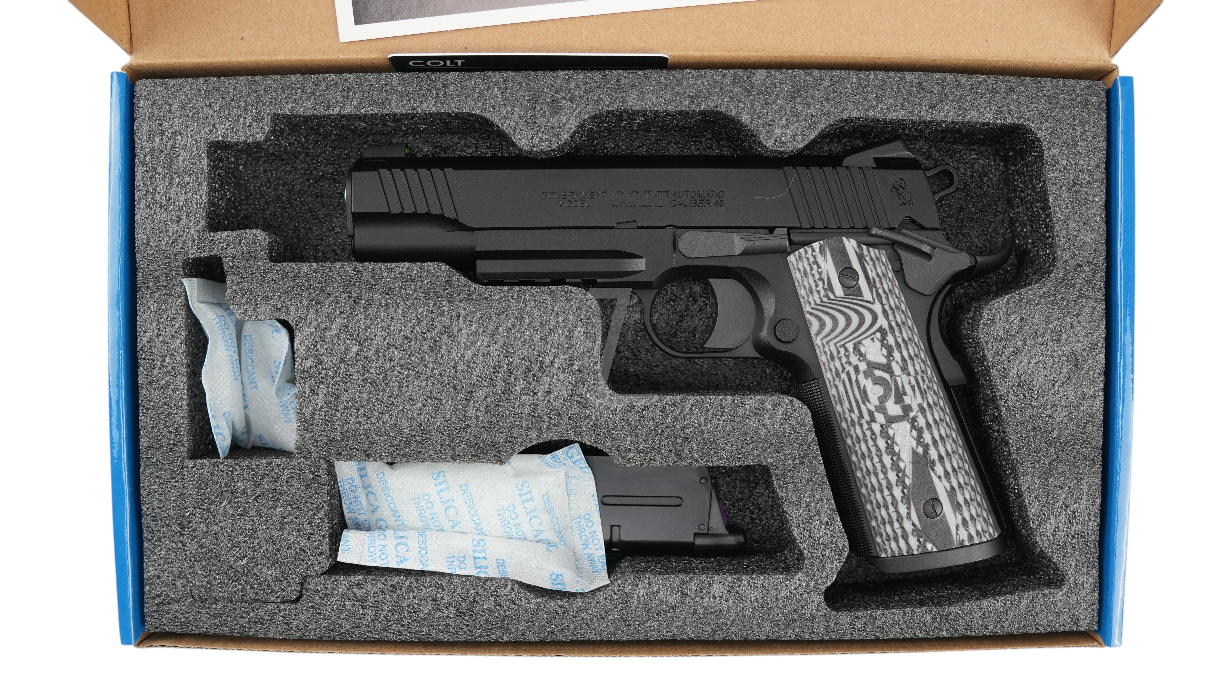 Landing Zone EMG Cybergun Colt 1911 Combat Unit GBB airsoft pistol in black with patterned grips inside foam packaging