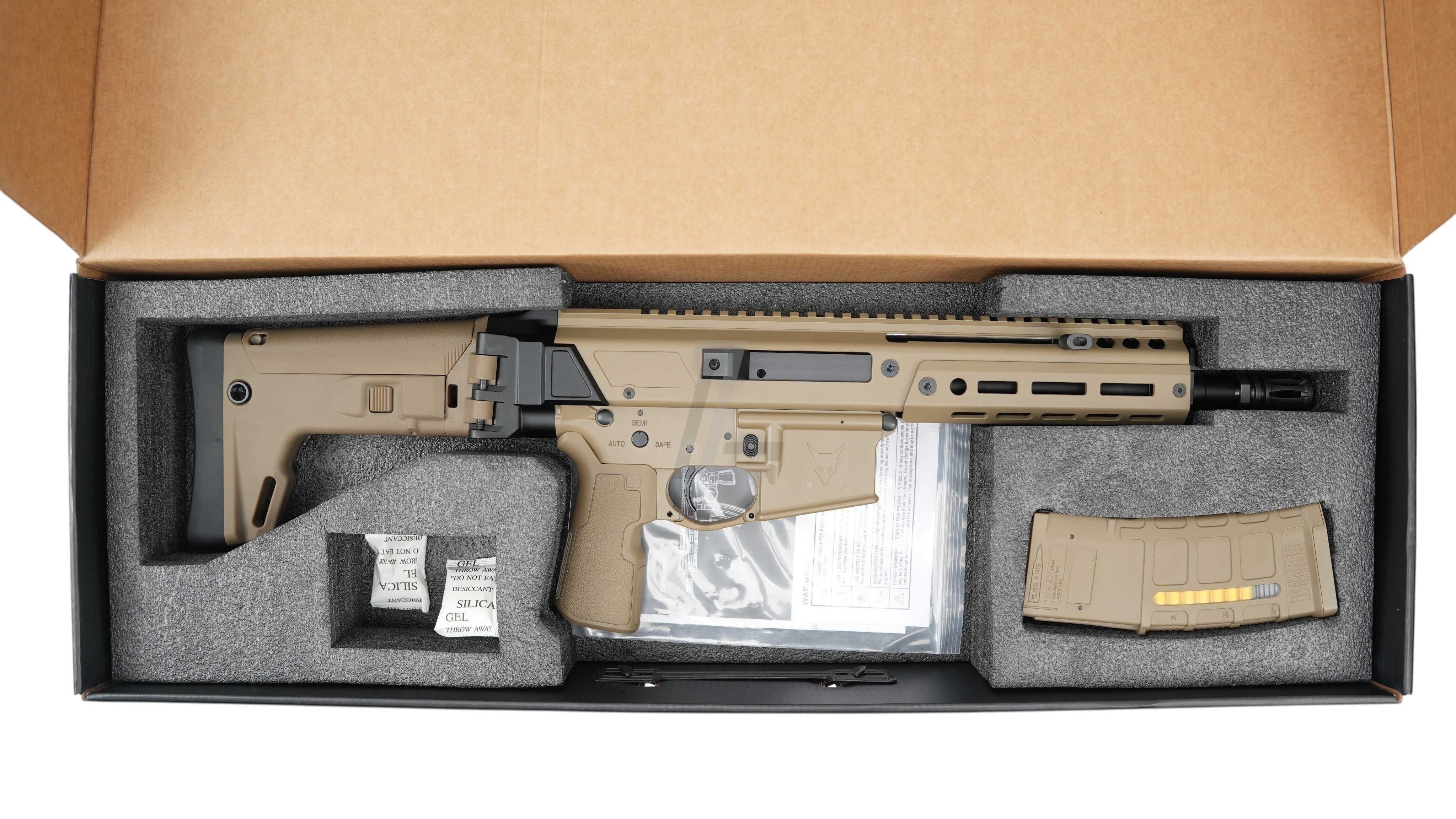 Landing Zone Double Eagle DWS Lupus 8.5 GBB airsoft rifle in FDE finish with magazine inside protective foam box