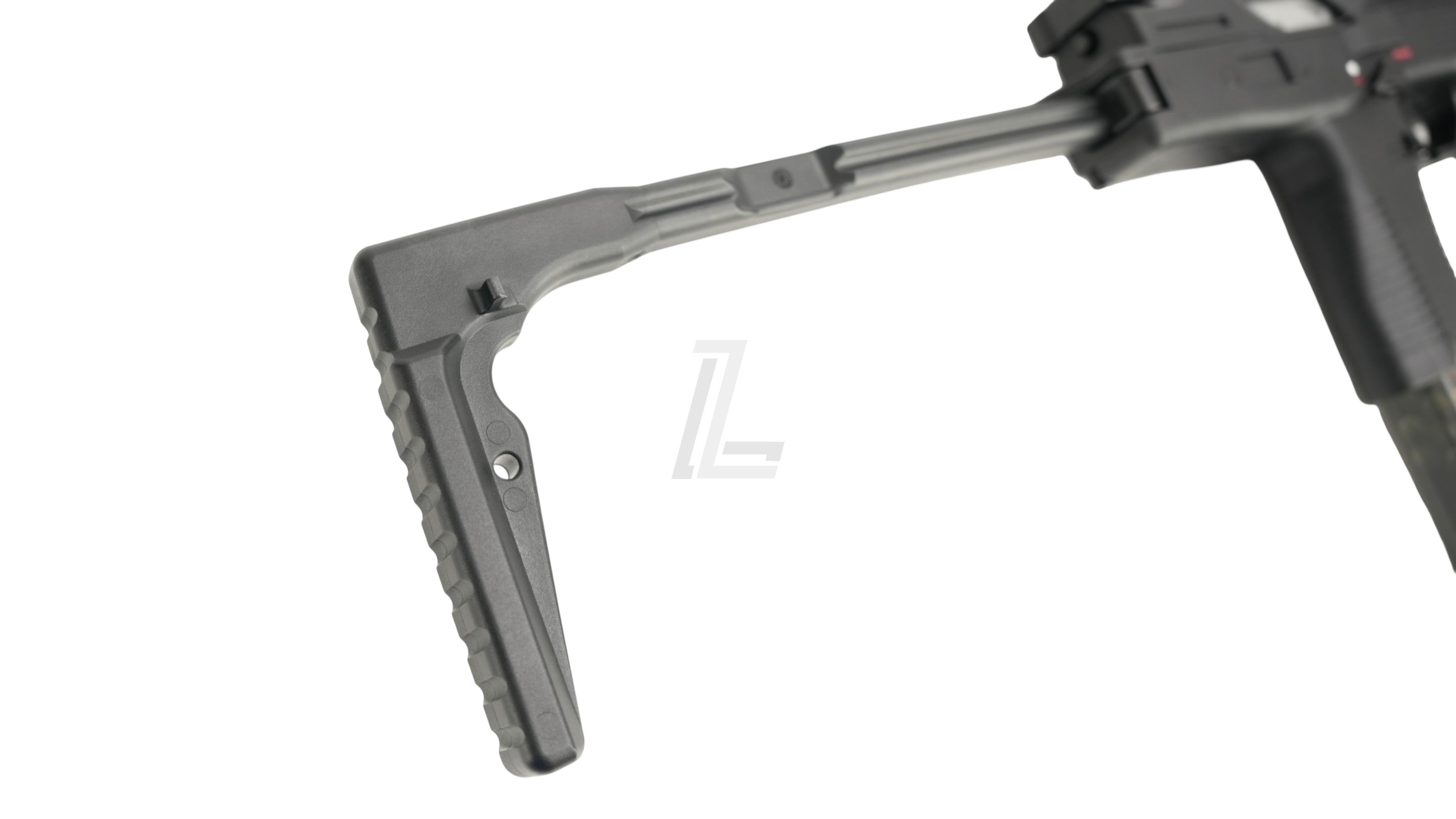Landing Zone MARUYAMA MP-IX MP9 DX GBB airsoft gun featuring a black retractable stock in a close-up view