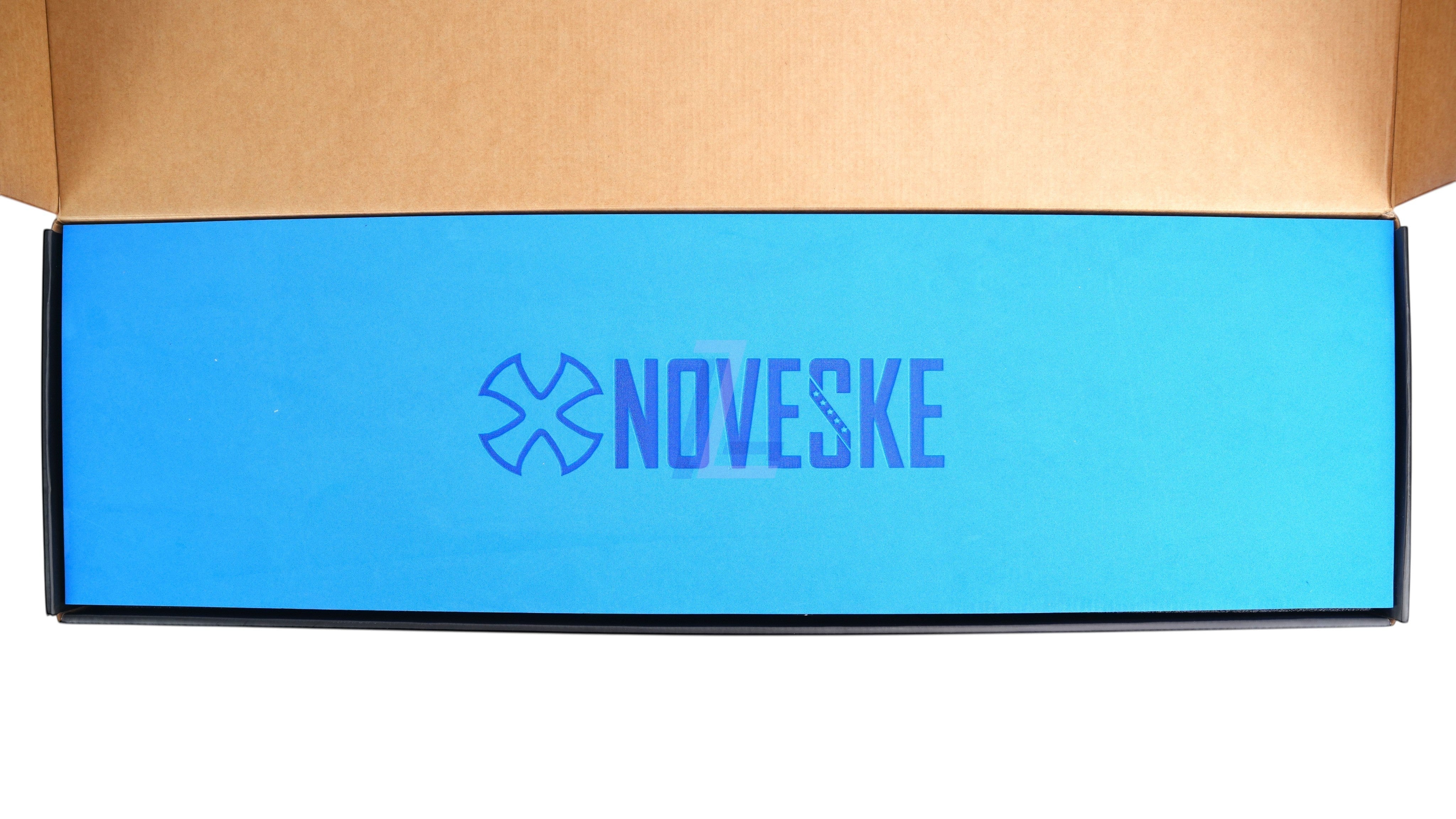 Landing Zone branded blue foam packaging insert featuring the Noveske logo inside a cardboard box