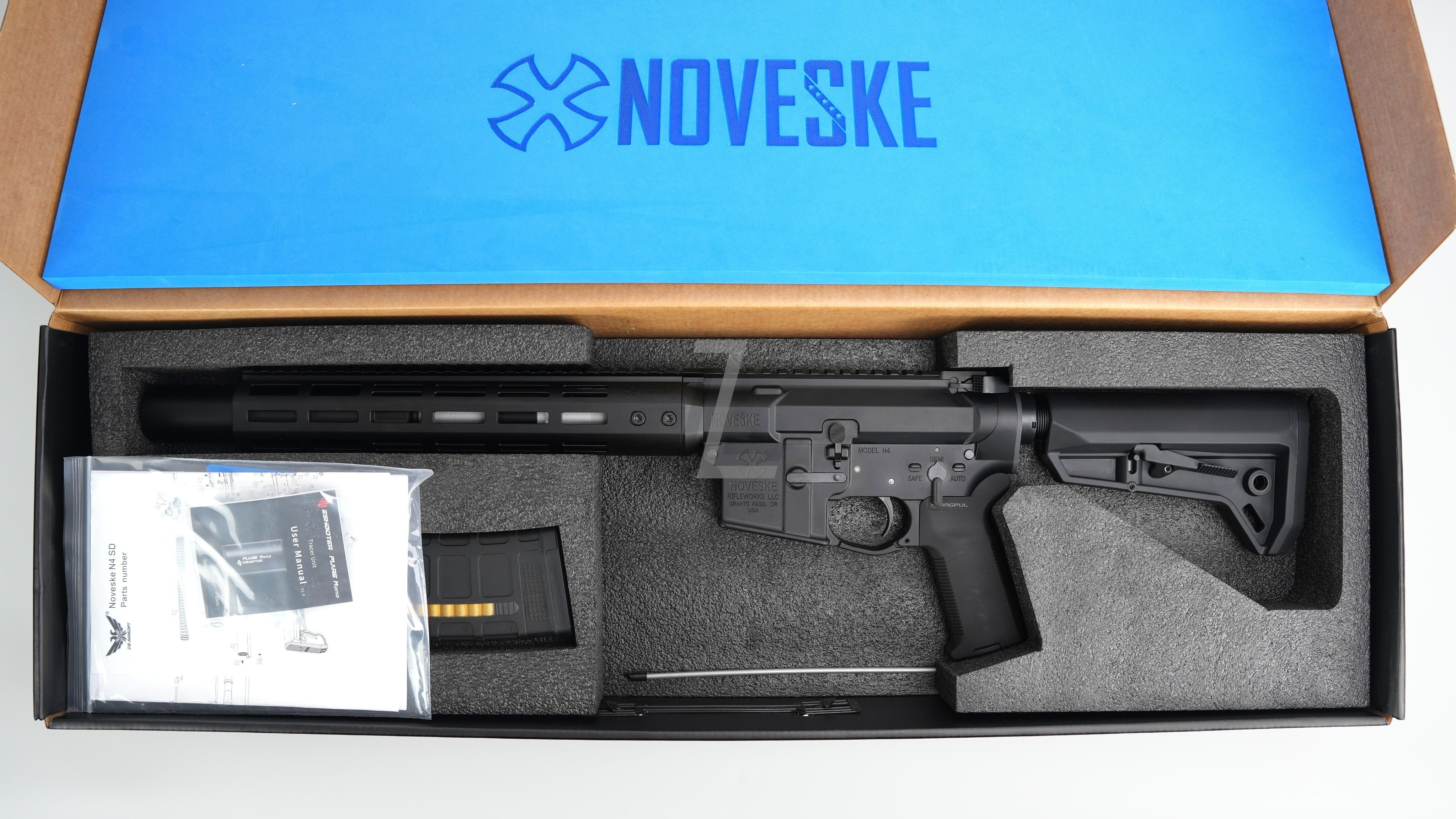 Landing Zone Double Eagle EMG Noveske N4 NSR GBB rifle in black with tracer unit and manual in branded box