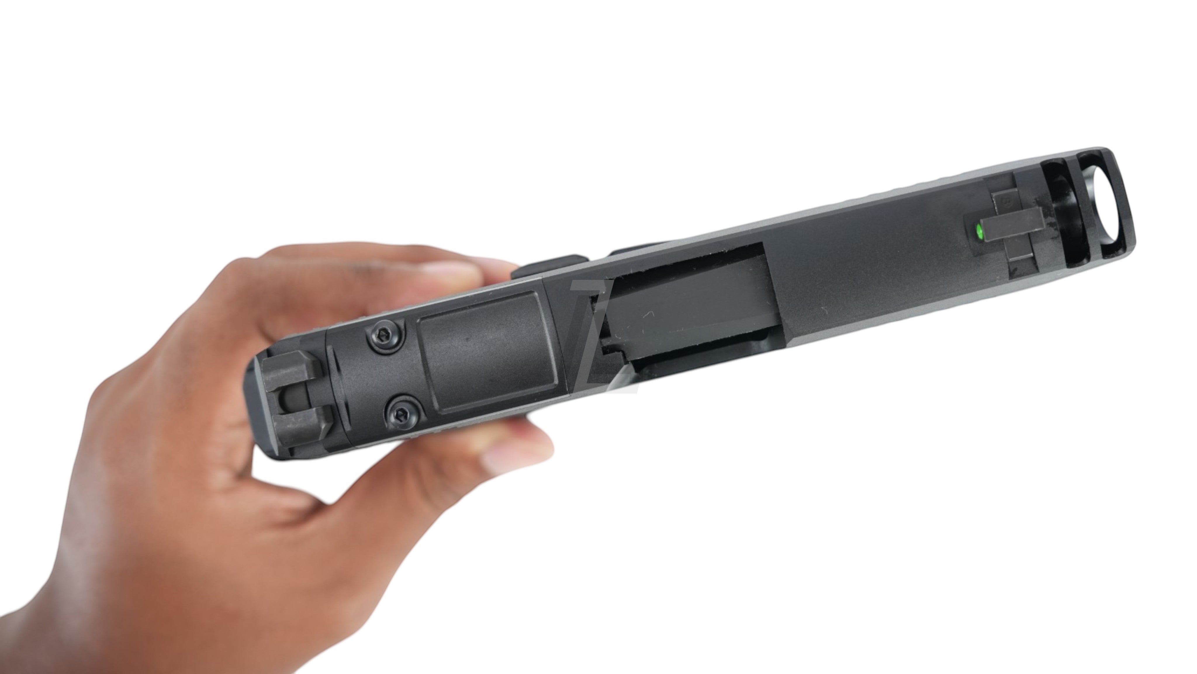 Landing Zone PARA BELLUM P365 X-MACRO COMP GBB airsoft pistol slide in black held in hand against white background