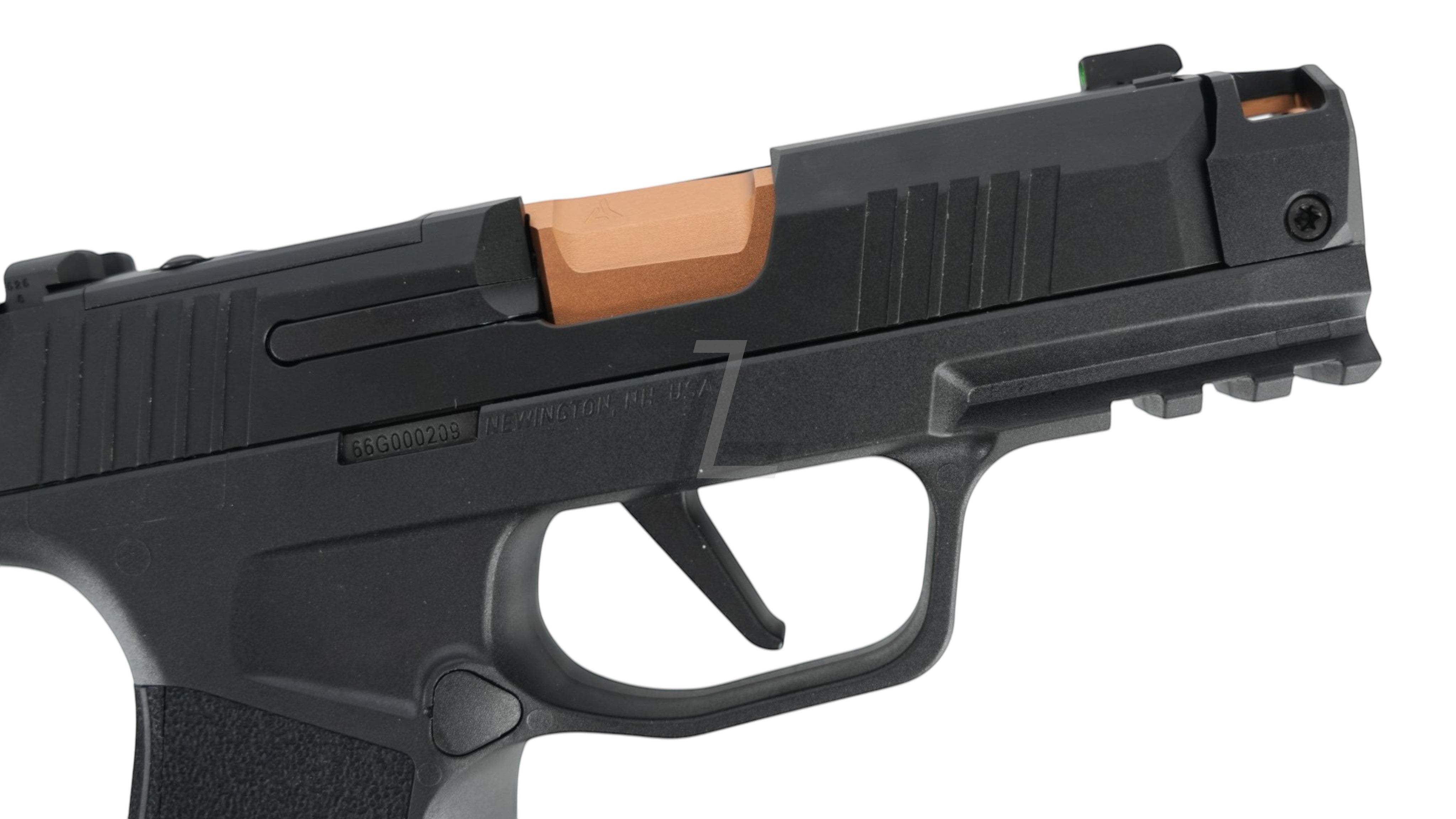 Landing Zone PARA BELLUM P365 X-COMP GBB airsoft pistol featuring a black slide with a copper-colored barrel.