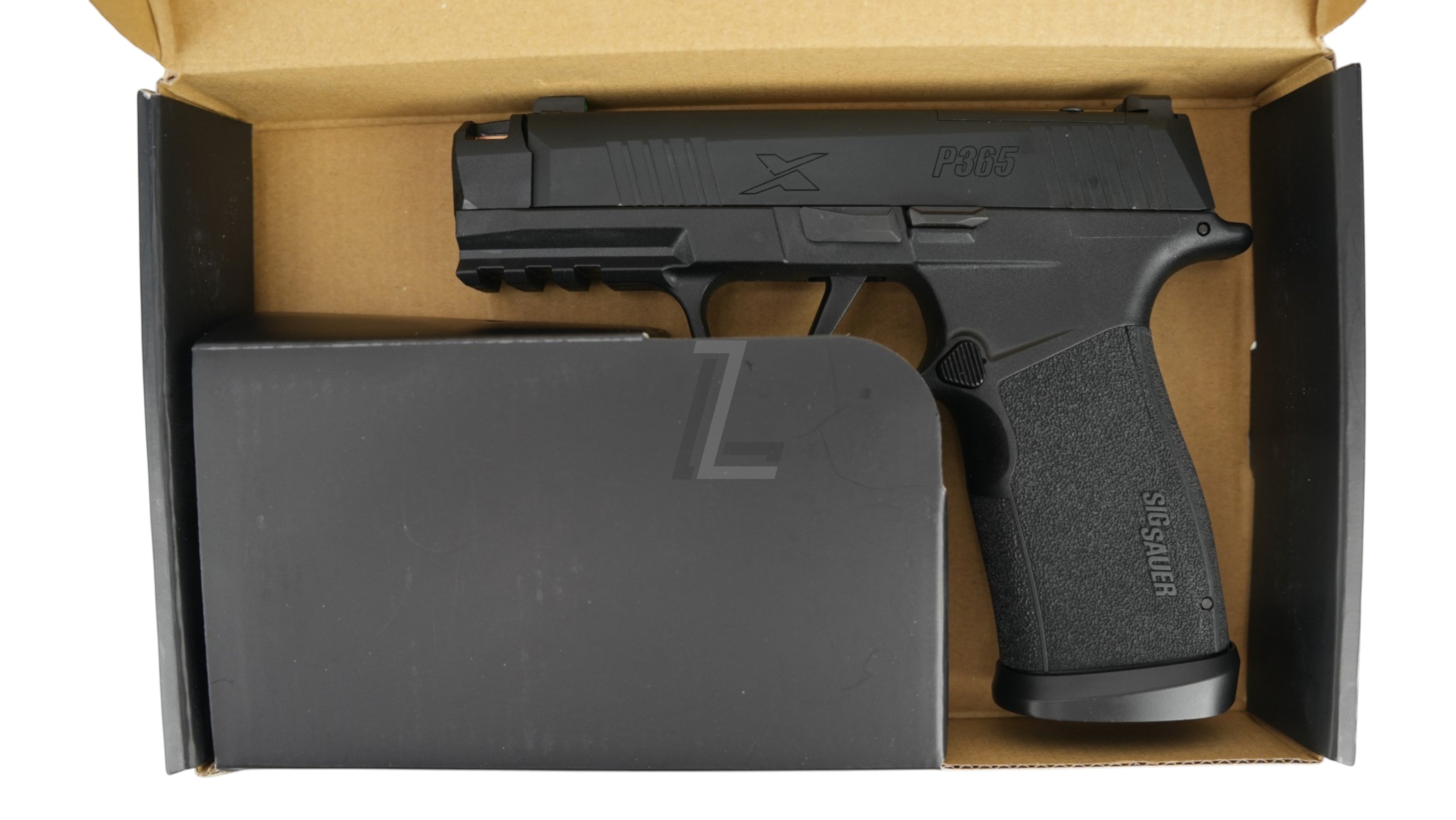 Landing Zone PARA BELLUM P365 X-COMP GBB airsoft pistol in black, featuring a textured grip and compensator design.