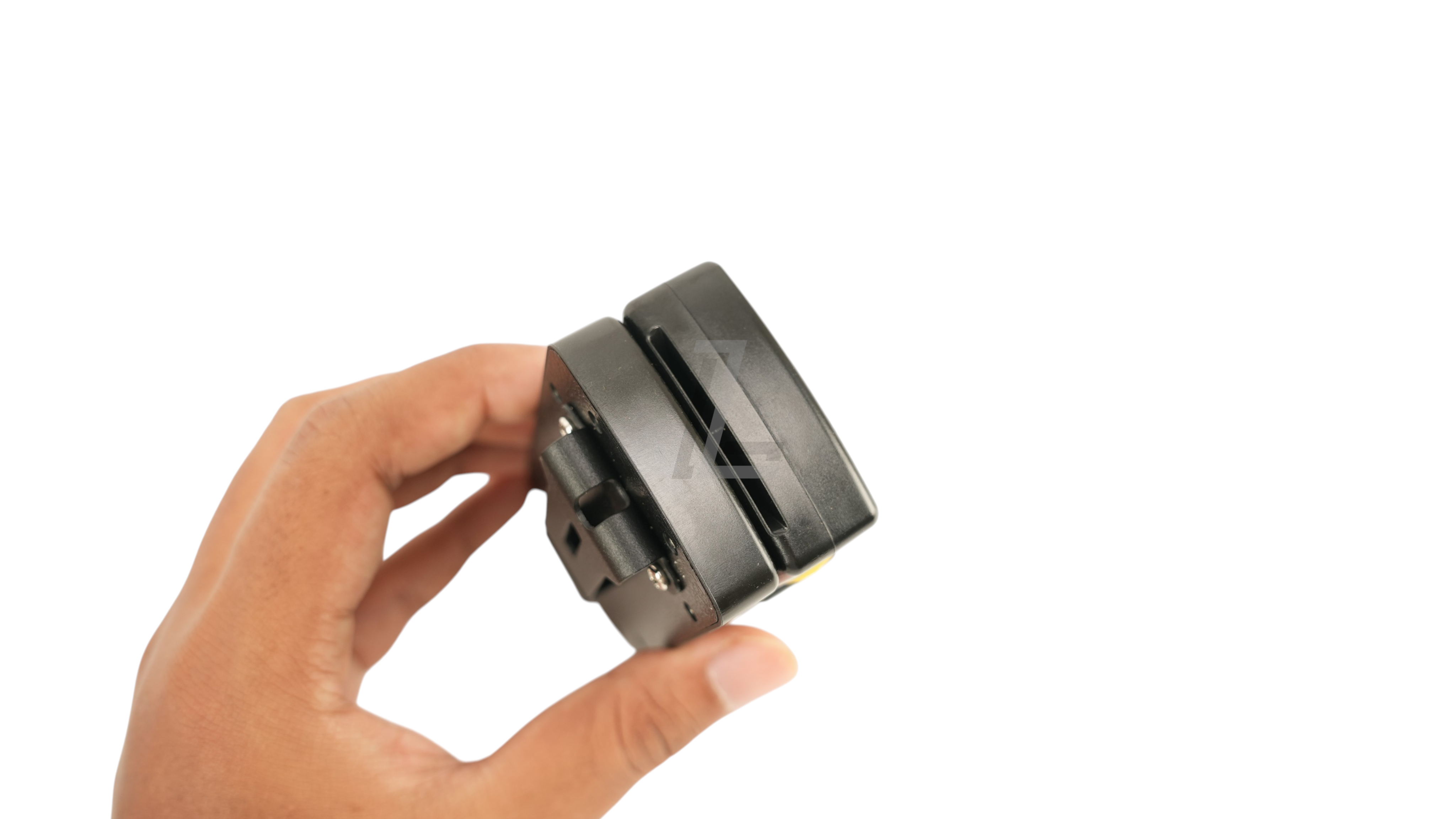 Landing Zone SHOOT GLOBAL SG TIMER 2 shot timer held in hand showing the compact black design and belt clip attachment