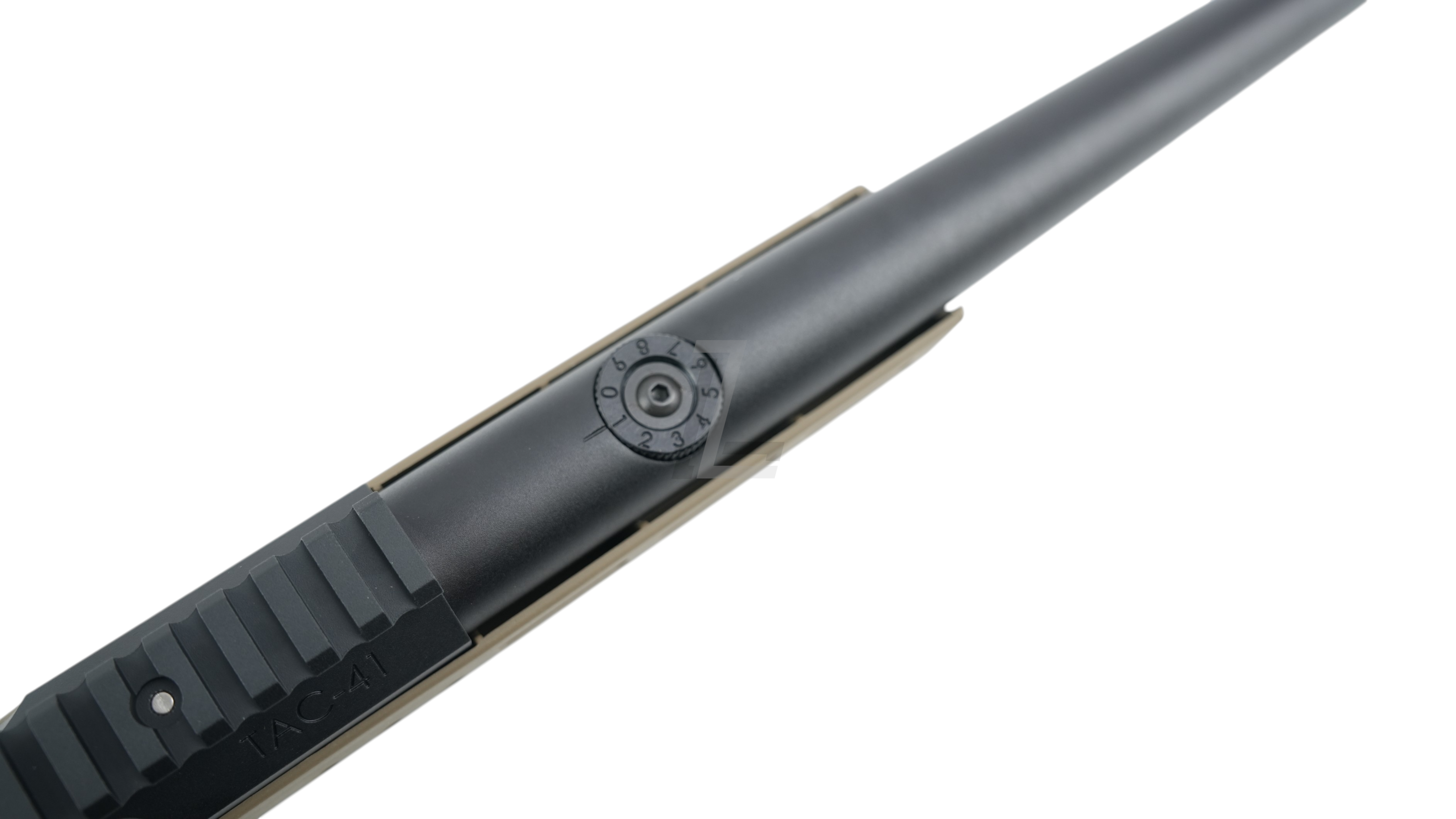Landing Zone SILVERBACK TAC 41 L bolt action rifle in FDE showing the adjustable hop-up dial on the barrel