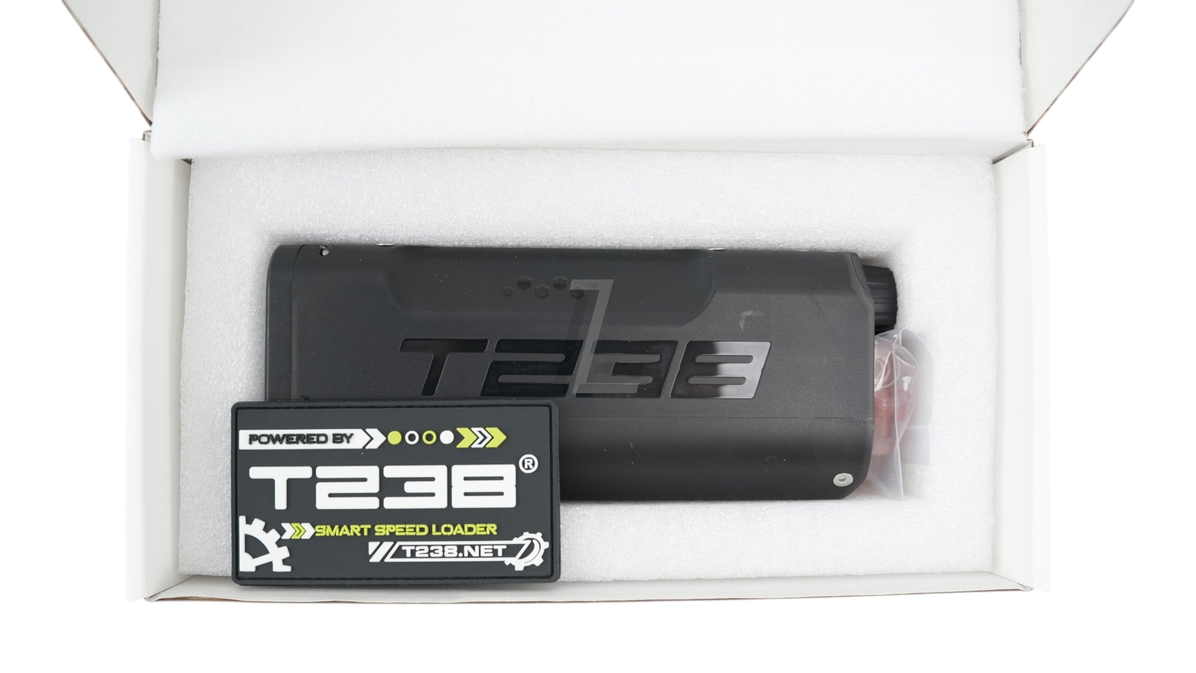 Landing Zone T238 Electric Speed Loader Lite in black, packaged in a white foam-lined box with a branded patch.