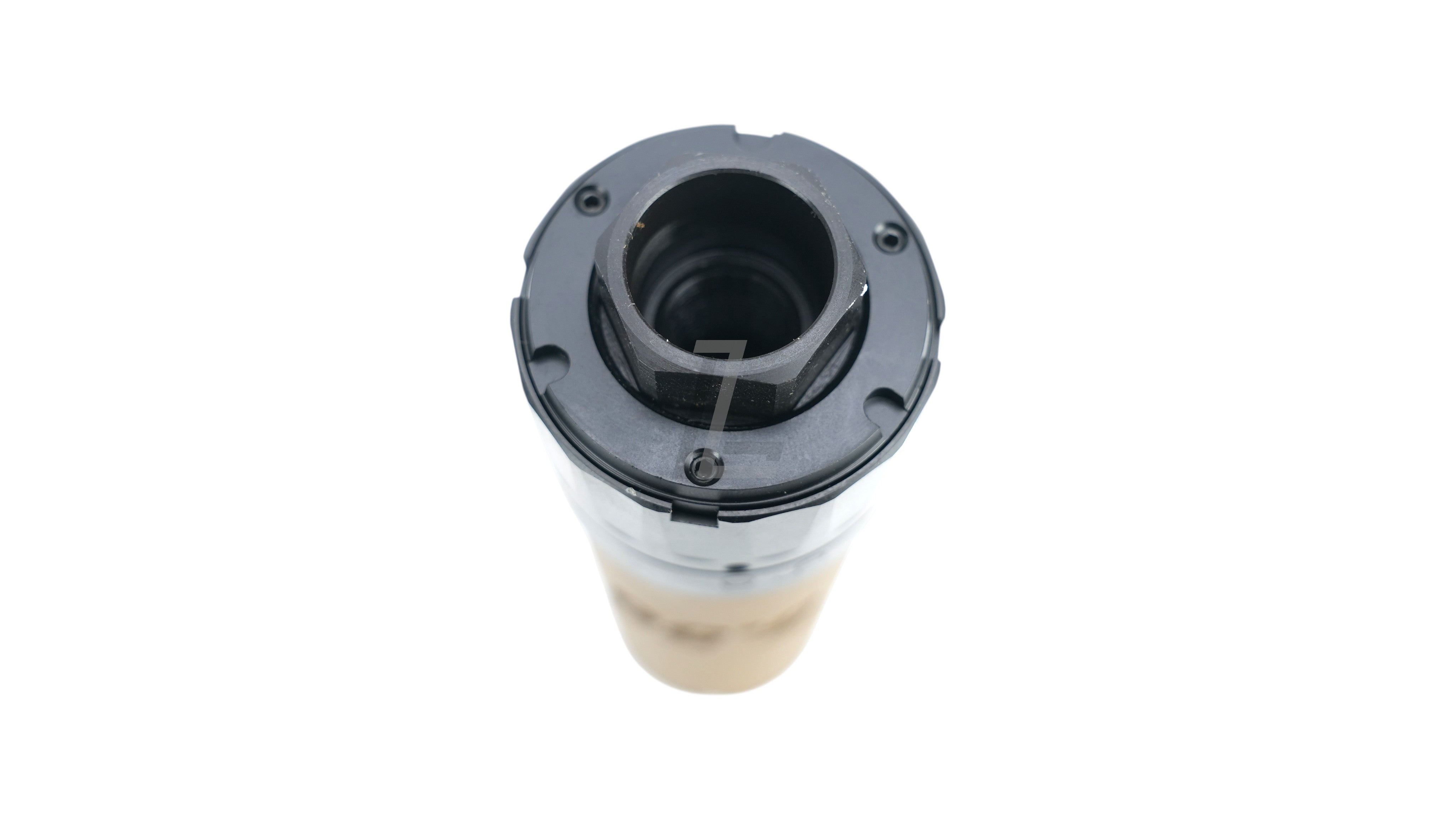 Landing Zone TASK FORCE SLX556C suppressor in tan with black flash hider attachment viewed from the front