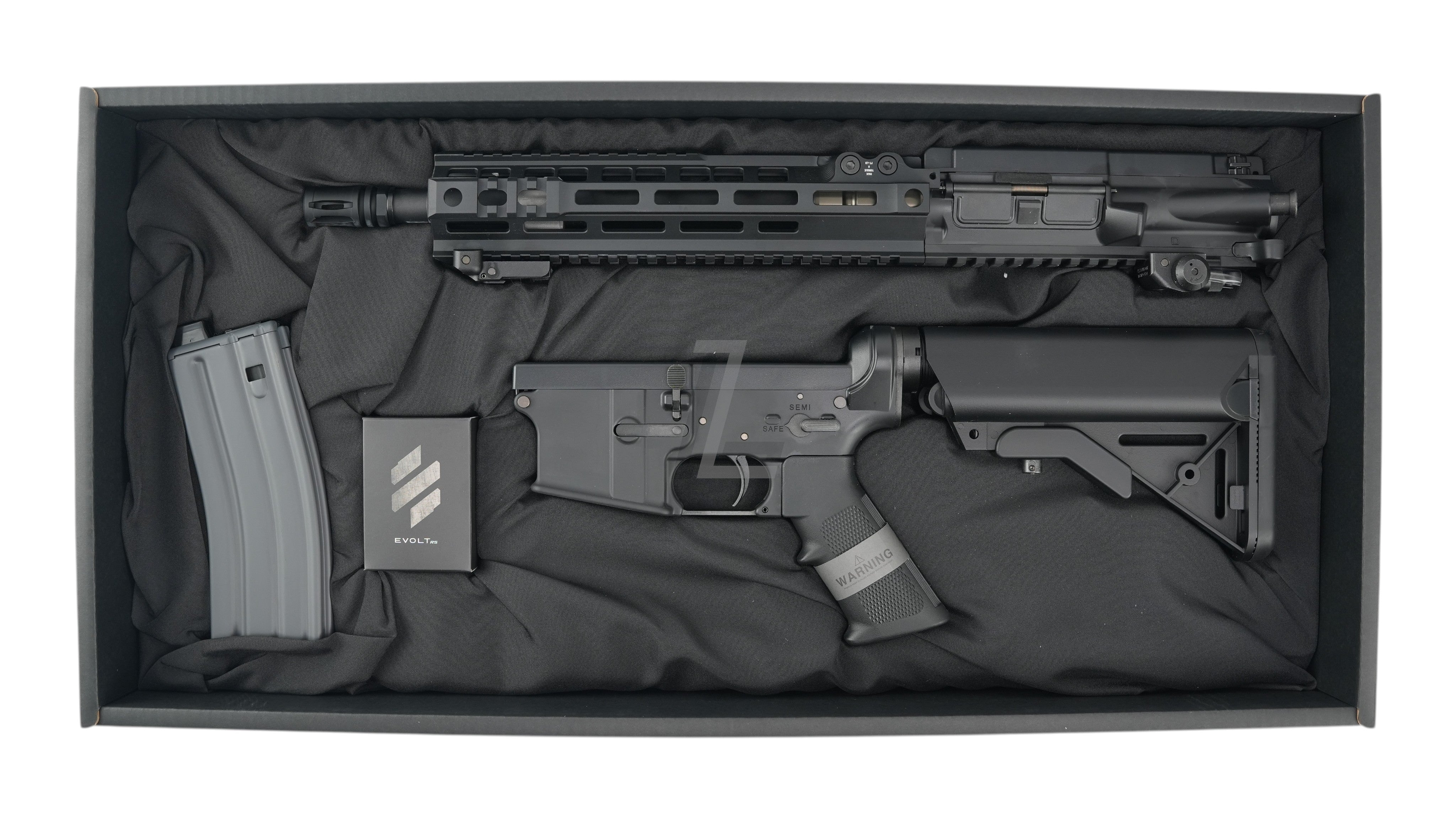 Landing Zone TOKYO MARUI EVOLT RS FPR MK IV airsoft rifle kit in black, disassembled in a presentation box.