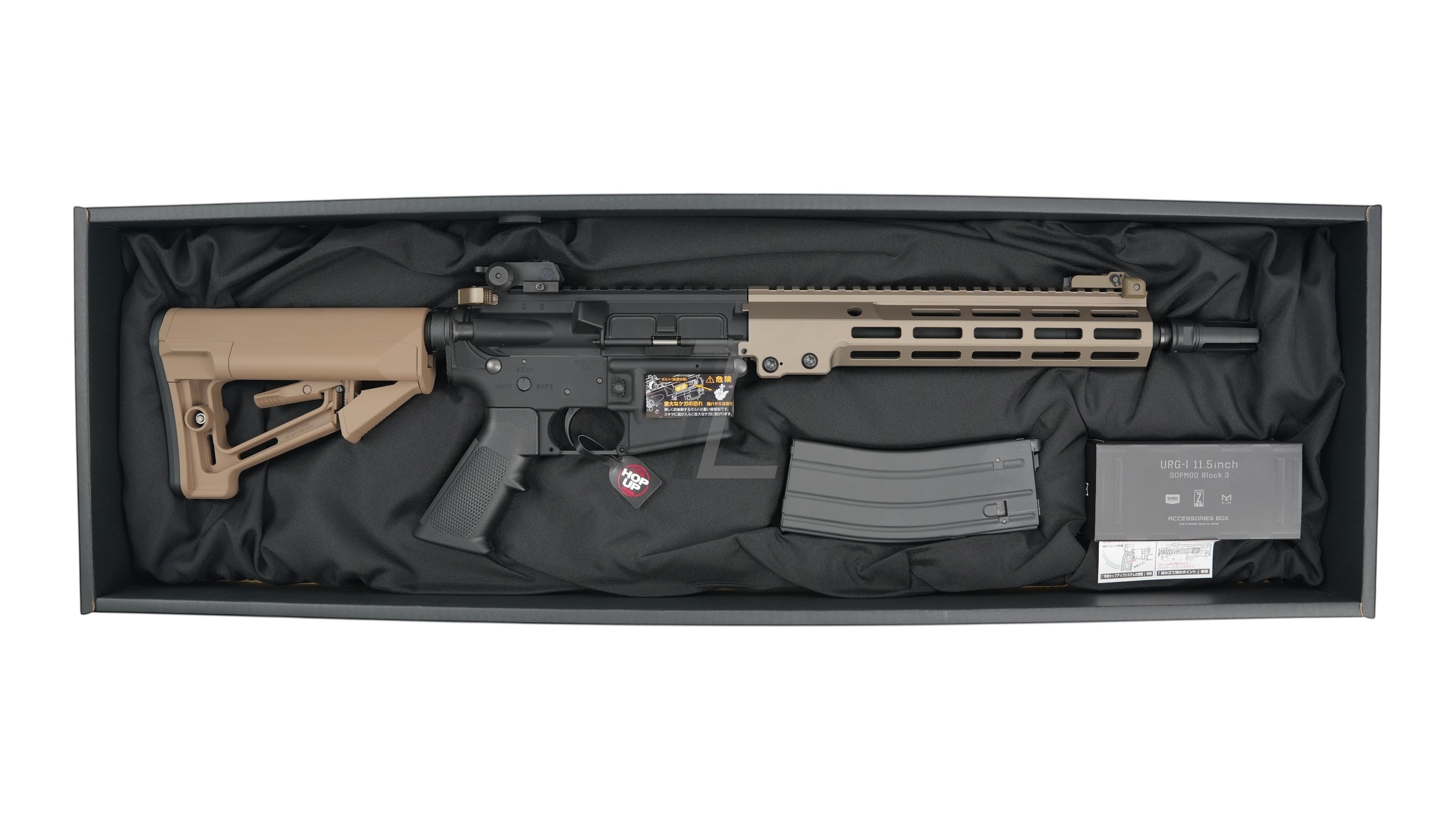 Landing Zone Tokyo Marui URG-I 11.5 inch GBB airsoft rifle in a black box with DDC handguard and tan stock
