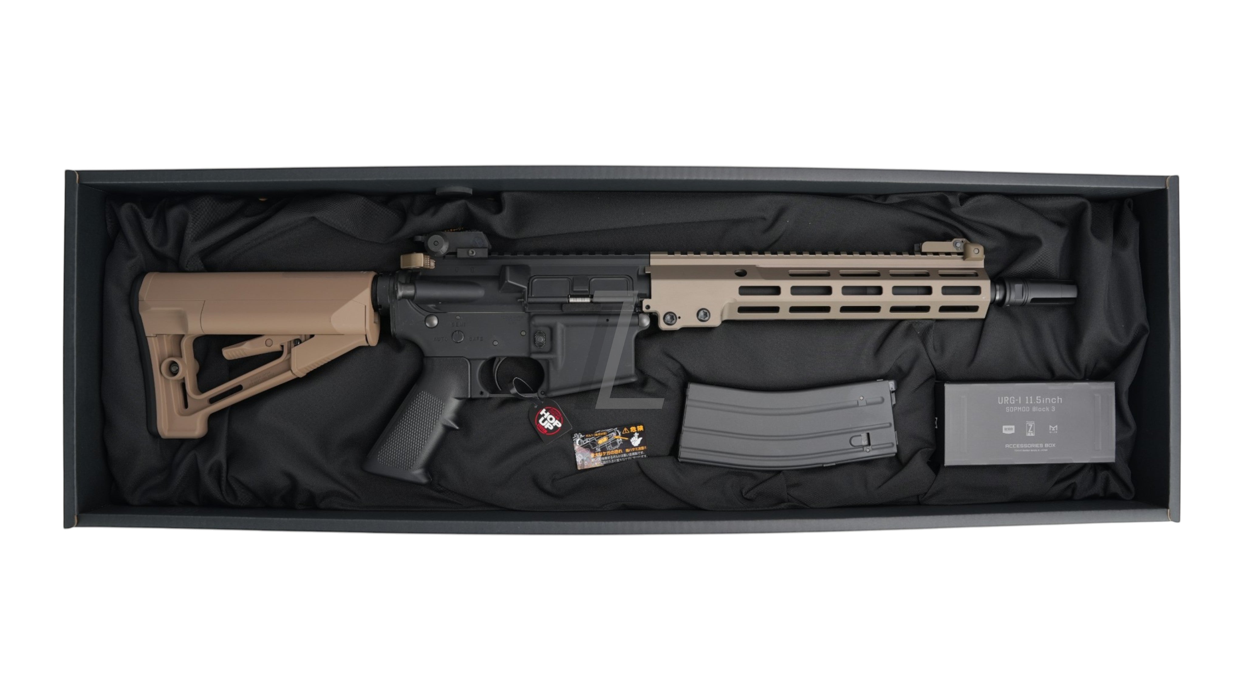 Landing Zone Tokyo Marui URG-I 11.5 inch GBB airsoft rifle in black and tan with magazine in original packaging