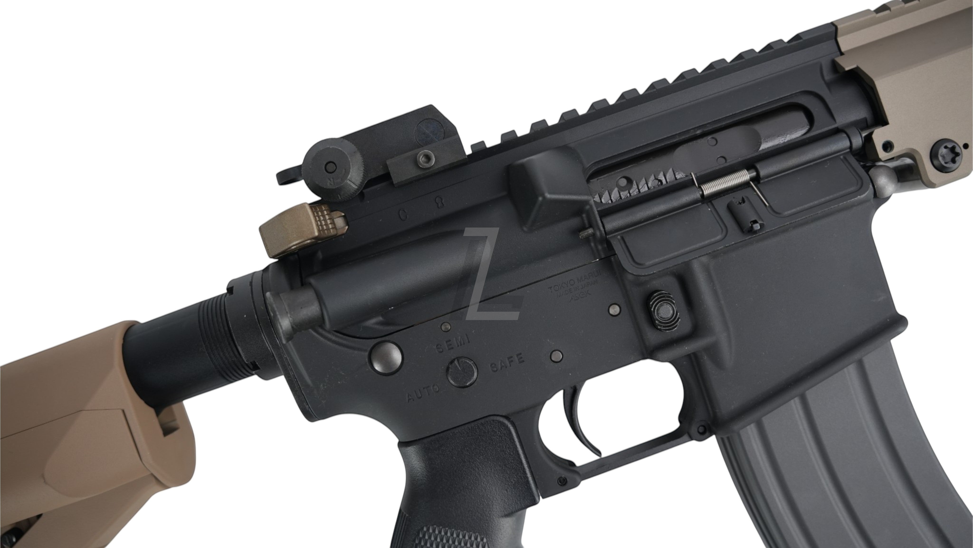 Landing Zone Tokyo Marui URG-I 11.5 inch GBB airsoft rifle featuring a black receiver and tan furniture.
