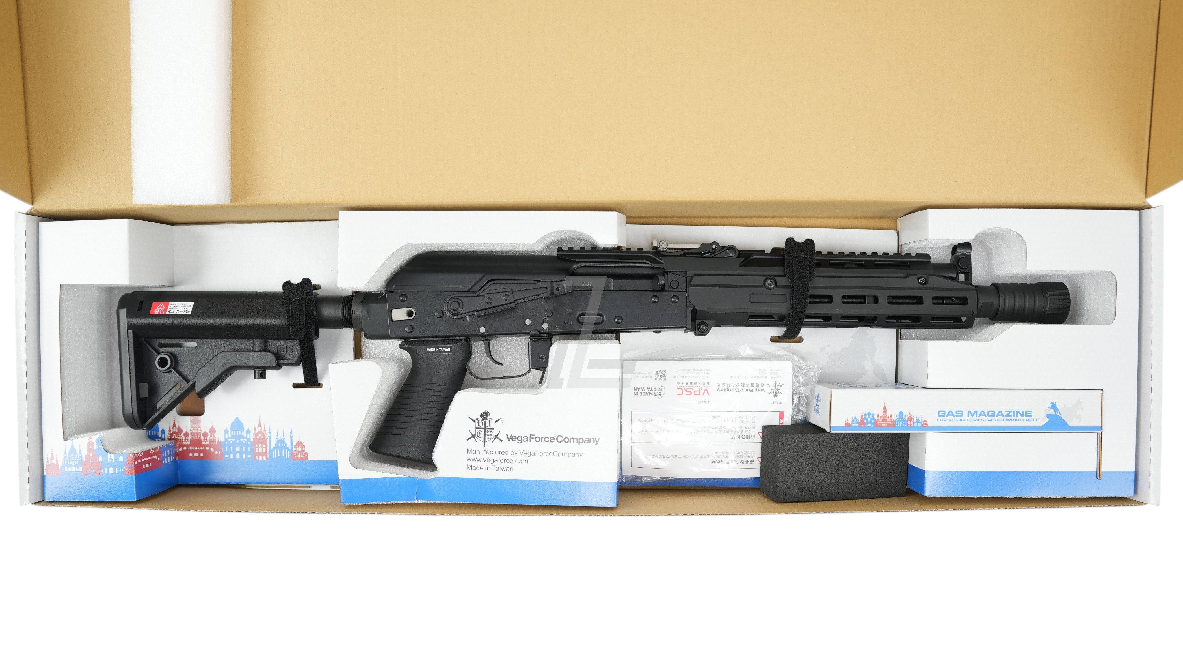 Landing Zone VFC AK105 tactical GBB airsoft rifle in black, featuring an M-LOK handguard and retractable stock in box.