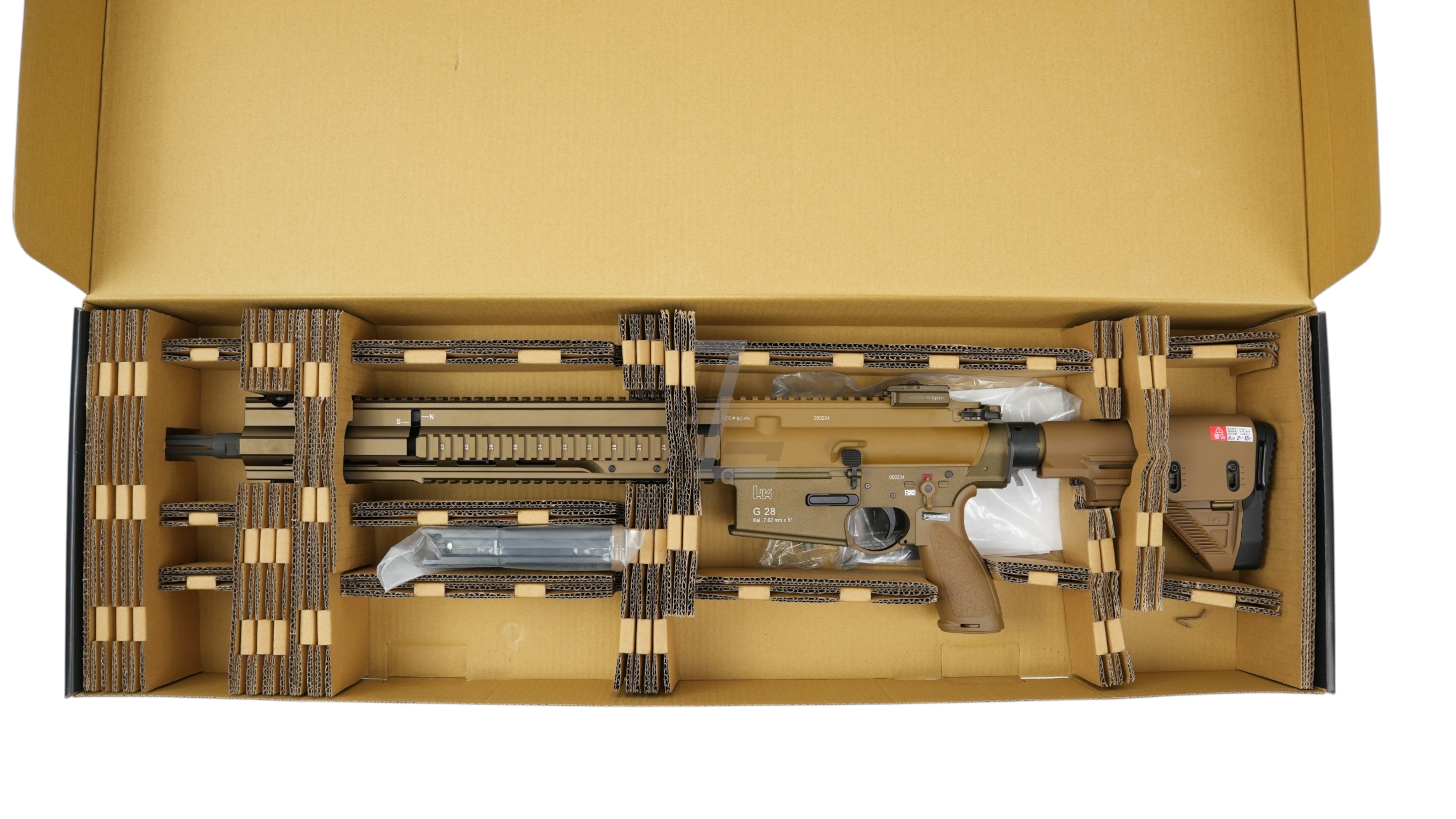 Landing Zone VFC G28 GBB airsoft rifle in tan, Umarex licensed DMR model, securely packed in a cardboard box.