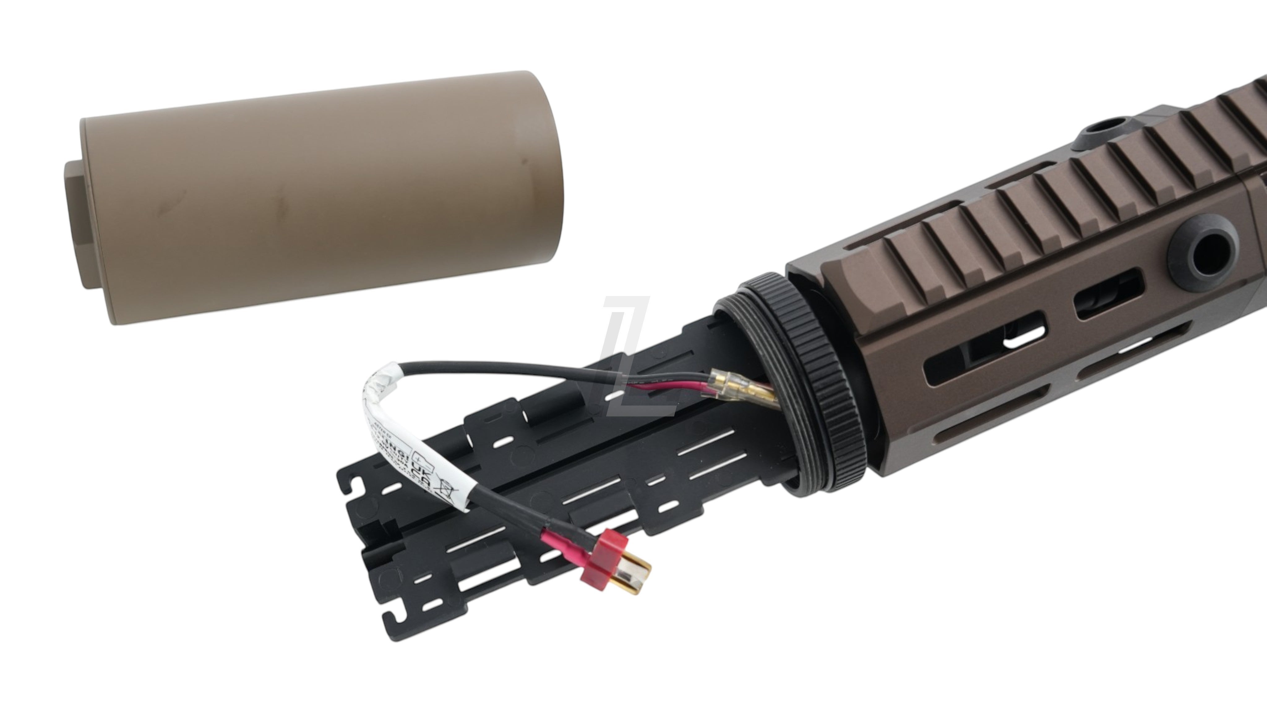 Landing Zone VFC PDX-SD airsoft AEG in tan with detached suppressor and exposed battery compartment wiring