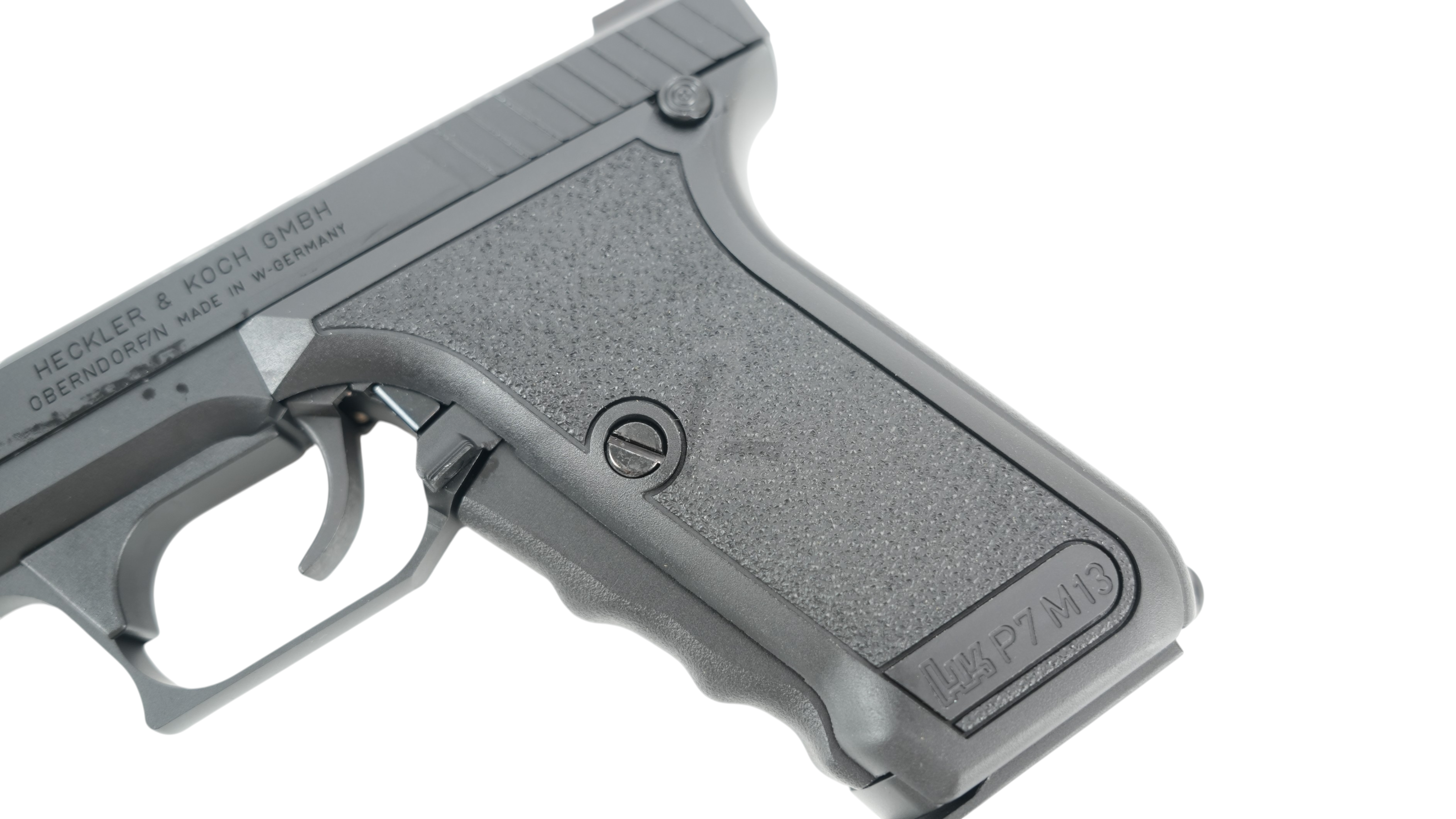 Landing Zone VFC Umarex P7M13 airsoft pistol grip detail with textured surface and authentic markings in black